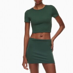 Aritzia Contour Mini Skirt in Scarab Green – Size M (Brand New, with tags)
